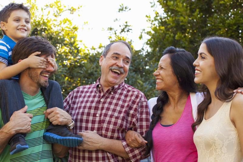 happy and smiling hispanic family