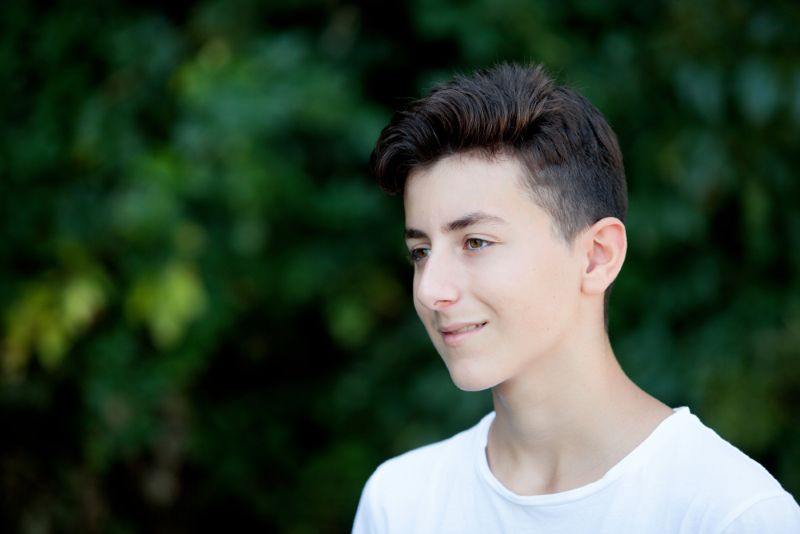 young hispanic teenager smiling